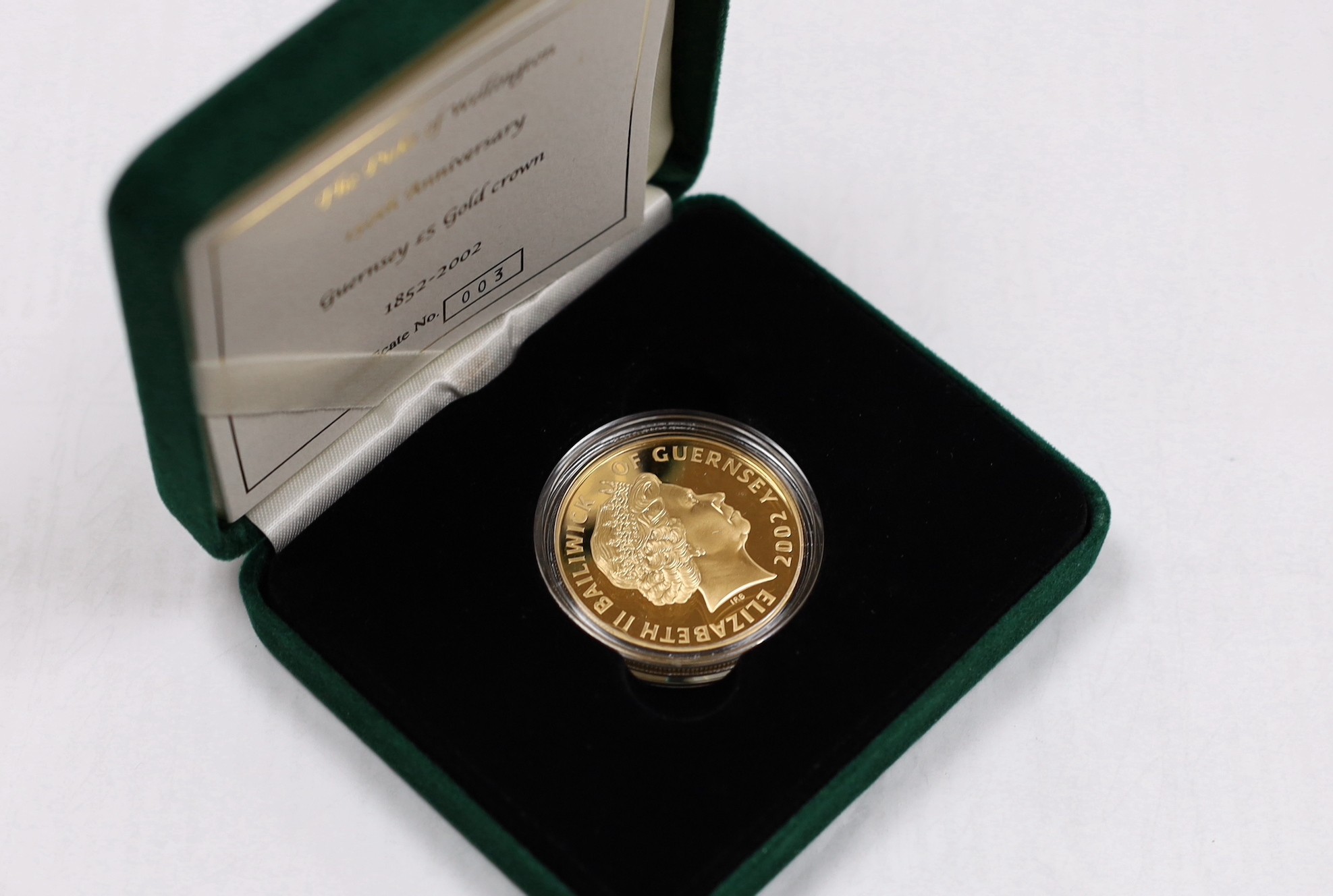 A cased limited edition 2002 'The Duke of Wellington 150th Anniversary Guernsey £5 gold crown 1852-2002', with certificate.